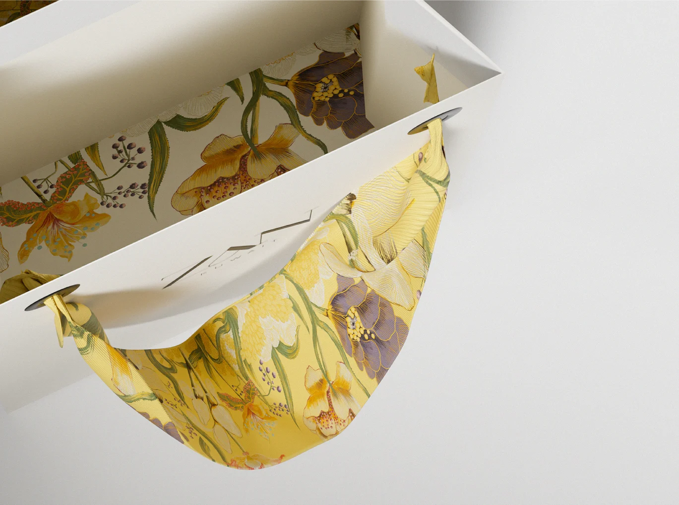 Zan floral packaging with flowing yellow fabric